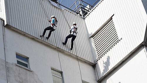 Bobby Dean MP abseils St Helier for charity