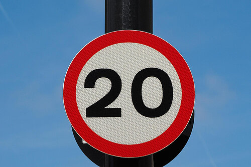 Twenty miles per hour speed sign.